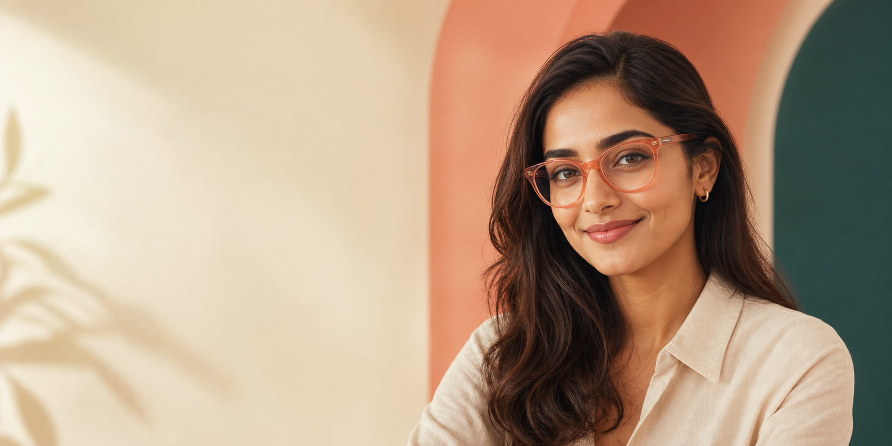 Woman wearing coral cat-eye eyeglasses